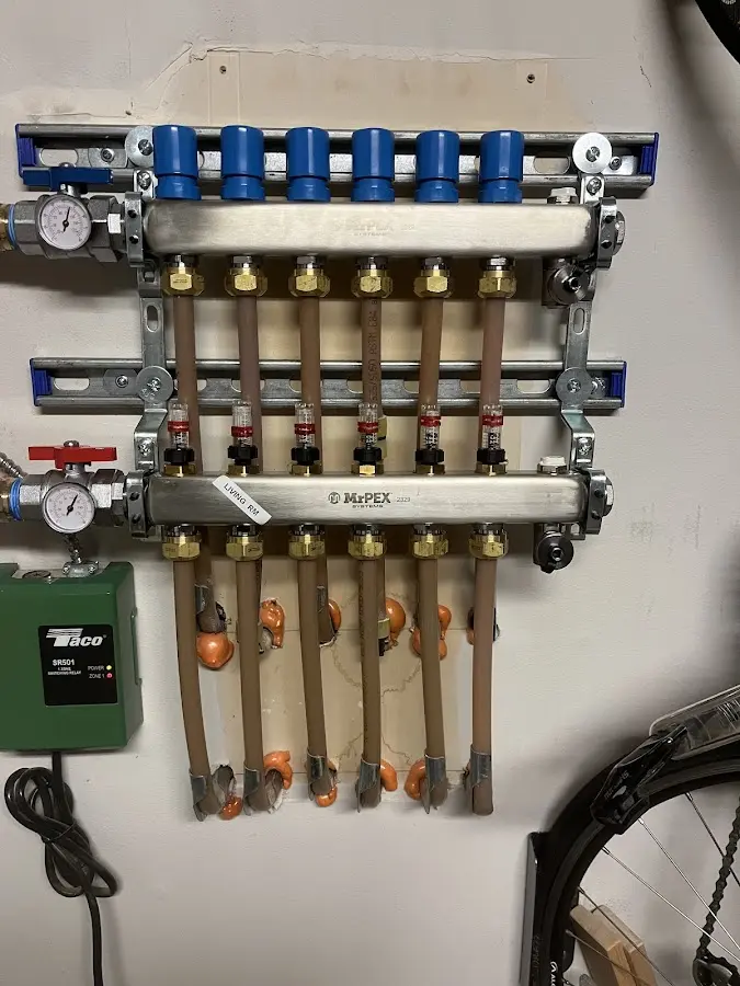 Plumber performing Water Heater Repair at a residential property in Peoria